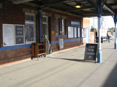 A gallery on a train platform picture